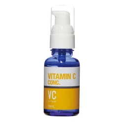白い背景の中央に、白いポンプが付いた青いガラスボトル「VITAMIN C CONC. VC 30ml」が立っています。